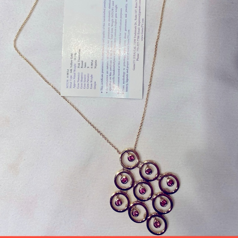 Beautiful 14 kt solid gold necklace with toggle closure and 9 pink tourmaline